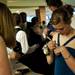 A Saline High School student writes a number on her hand for coat check during prom at EMU on Saturday, May 4. Daniel Brenner I AnnArbor.com